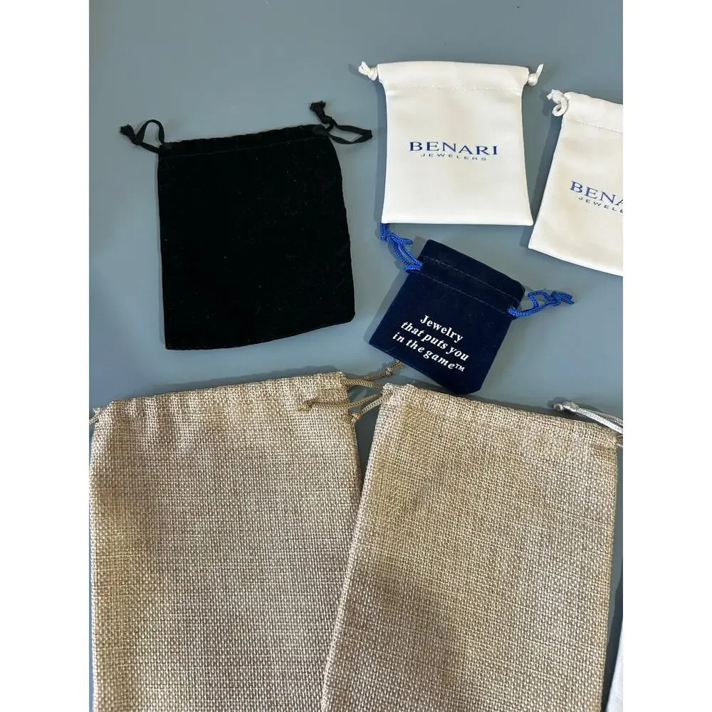 Collection of jewelry bags pouches gift bags various sizes and materials